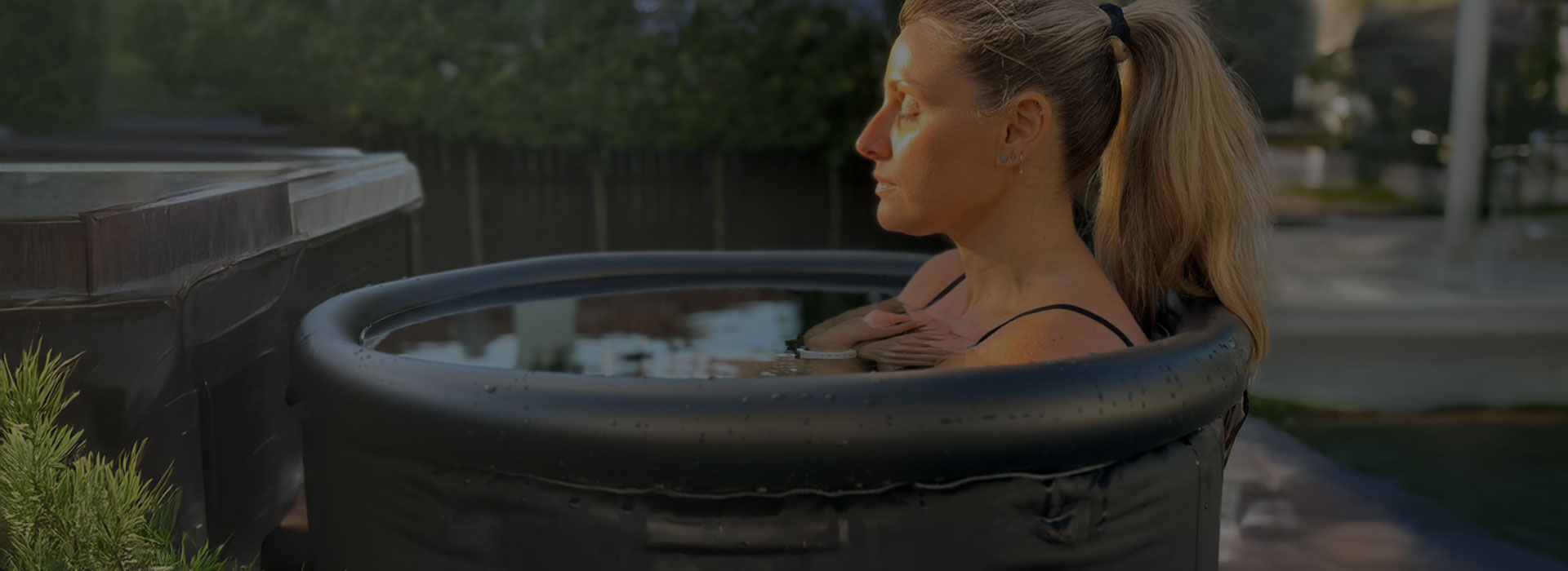Woman sitting in a Personal Ice Bath